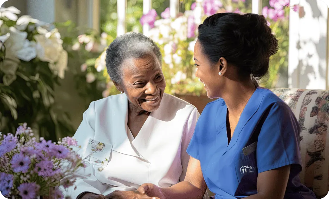 nurse and elderly lady having a conversation