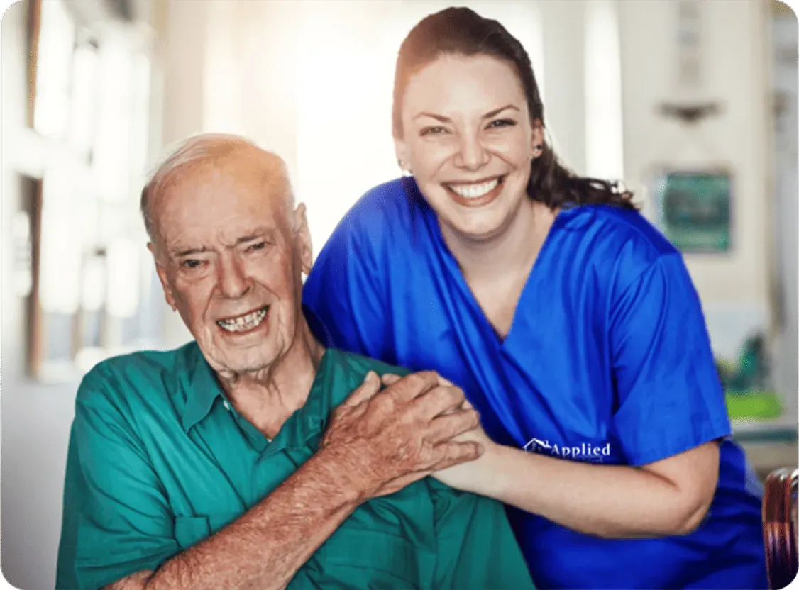 two elderly womebn laughing